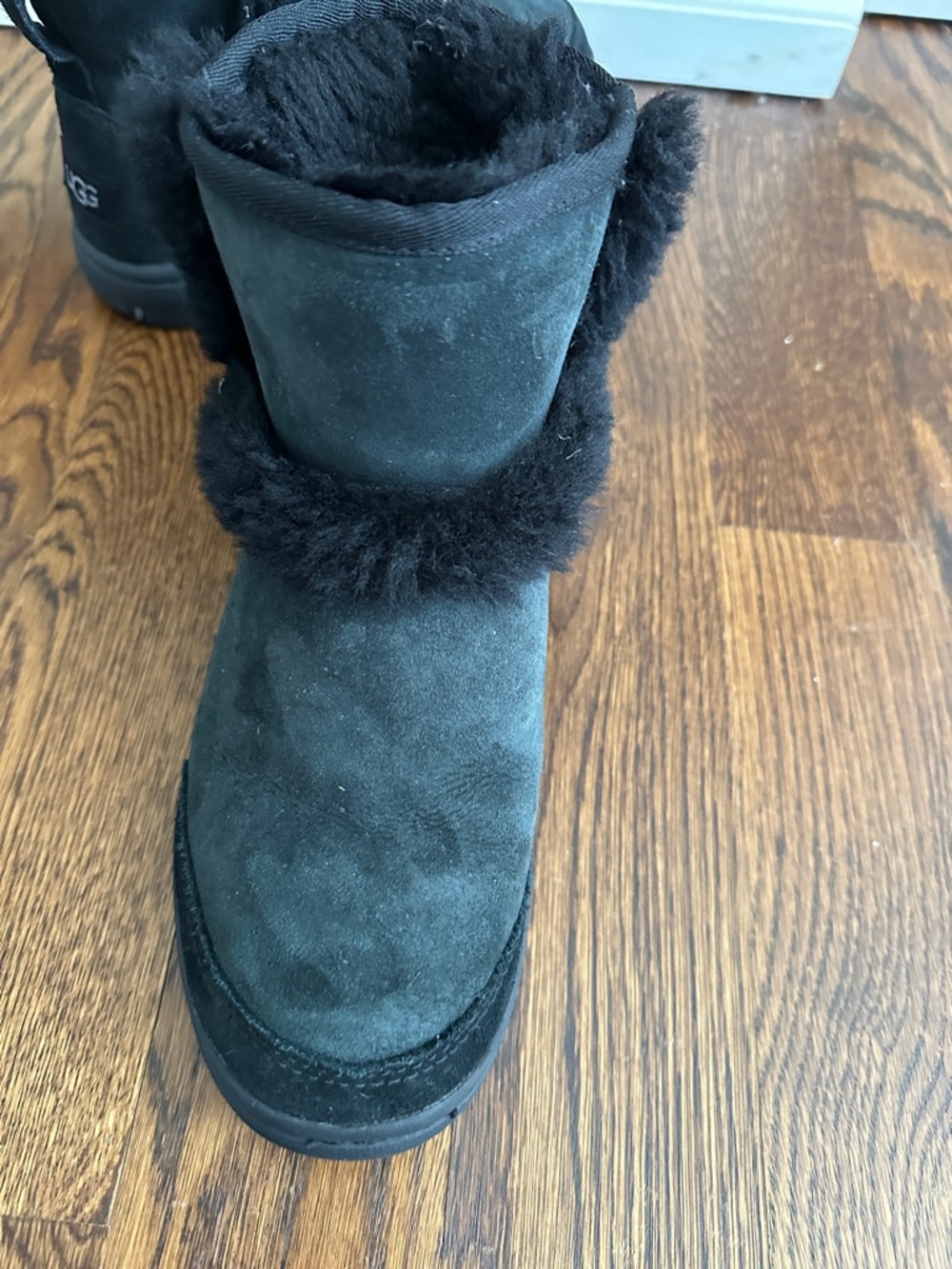 UGG Black Short Shearling Boot with Pom Detail - Picture 5 of 10